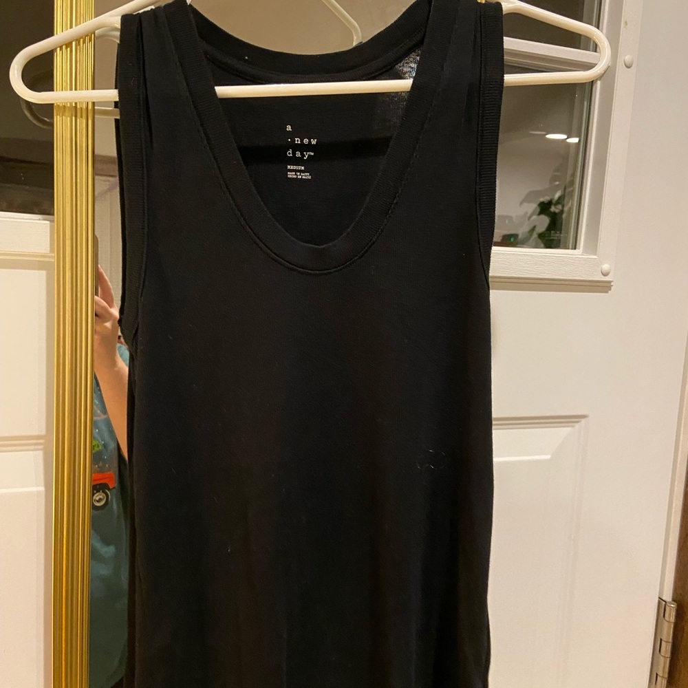 A New Day black tank
